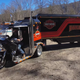 Image for article titled This Harley-Davidson Big Rig Camper Has 9 Wheels And Weighs 4,000 Pounds